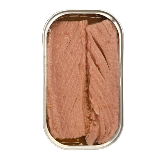 An open oval metal can of tuna fish with sliced pink tuna pieces visible inside, shown on a transparent checkerboard background.