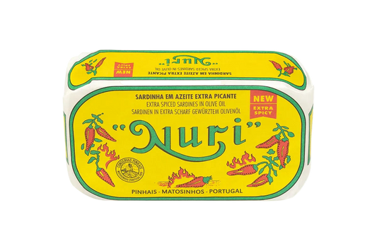 A tin of Nuri extra spicy sardines in olive oil, featuring a bright yellow label with green borders, red chili pepper illustrations, and the brand name 'Nuri' in large green script.