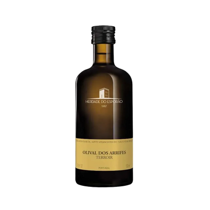 Bottle of olive oil with a visible label on a white background
