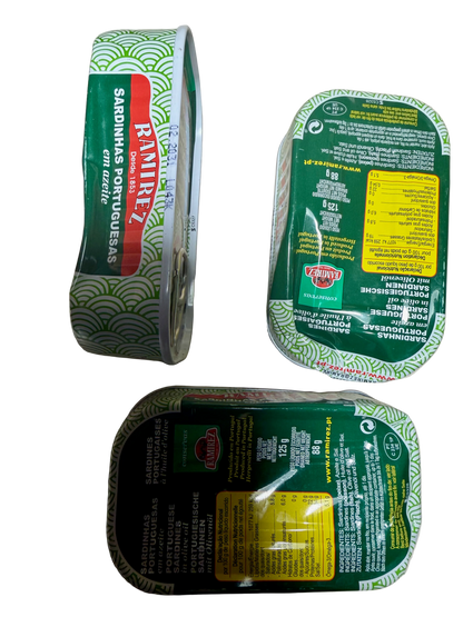 Three tins of Ramirez Sardinas Portuguesas on a light gray background